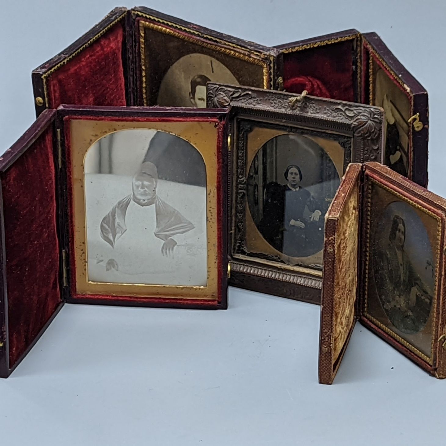 A 19th century cased Daguerreotype of a lady, six cased Ambrotype portraits and three 19th/20th century albums/diaries (two vacant). (10 items)